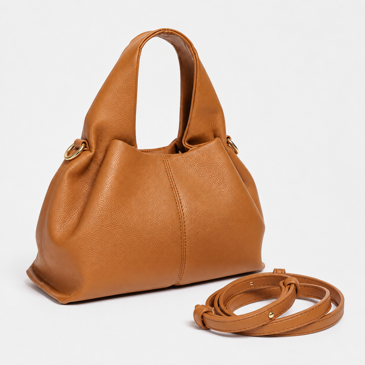 Close-up of La Luna top-grain cowhide, natural texture and stitching.