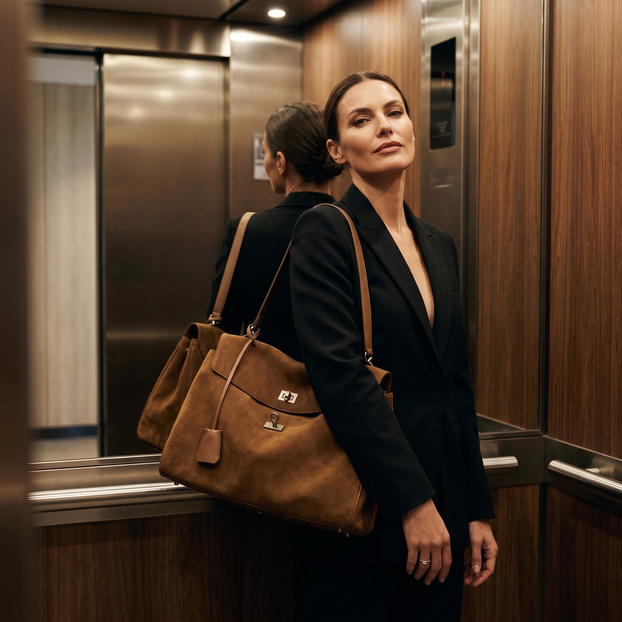 Macro detail of expertly crafted premium suede and solid brass hardware, natural light.
